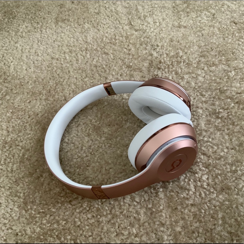 Rose gold beats by Dre headphones